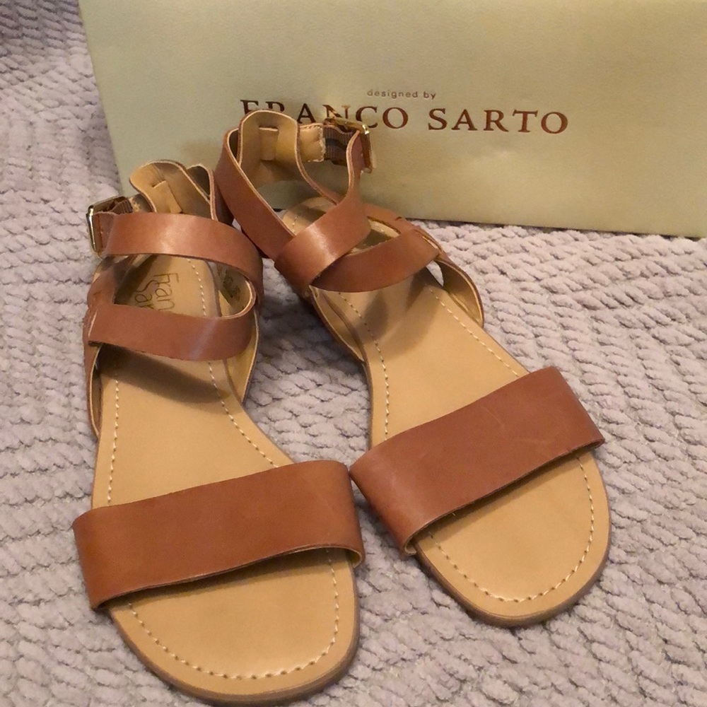 Brown leather flat sandal. New.